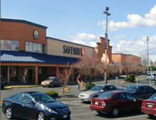 A parking lot of Nob Hill Shopping Center