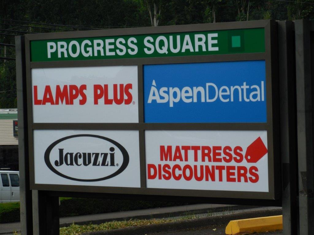 Store signages at Progress Square