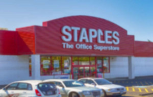 Staples storefront and parking space